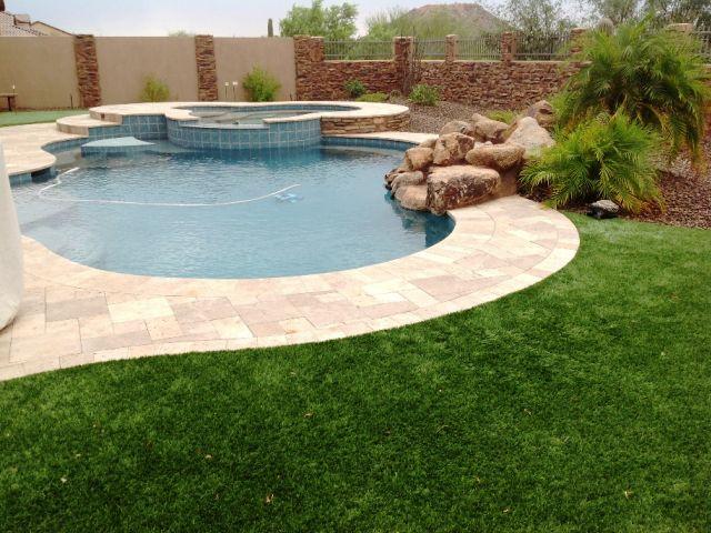 Beautiful 80oz Artificial Grass With Travertine Pool Deck And Centurion Stone Veneer Walls | Centurion Stone Of Arizona