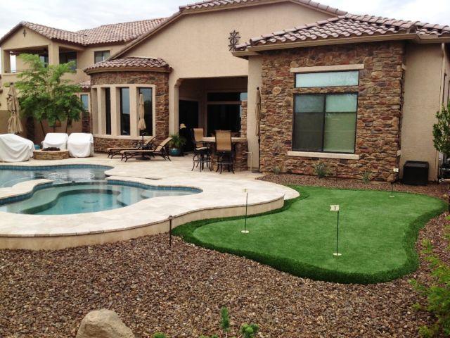 This Beautiful Putting Green, Travertine Pool Deck And Ston Veneer Walls Were Installed By Centurion Stone Of Arizona