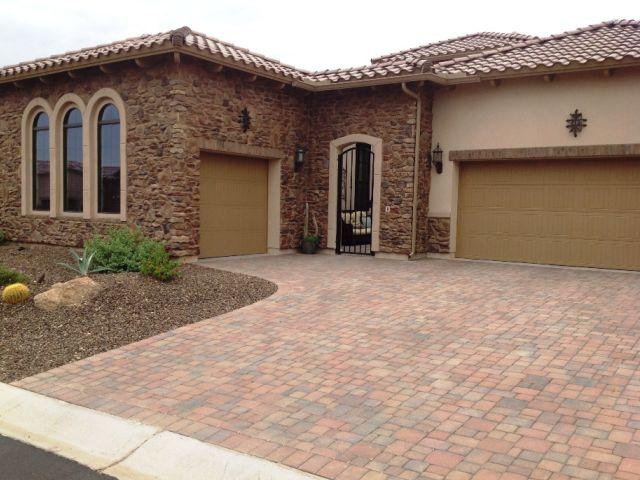 This Driveway Used Four Different Size Tierra Norte Pavers And Sillouette Suede Ledge Stone Veneers On The House Walls | Centurion Stone Of Arizona