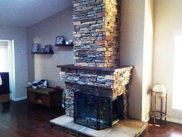 After centurion stone veneer stack-style fireplace facade in AZ