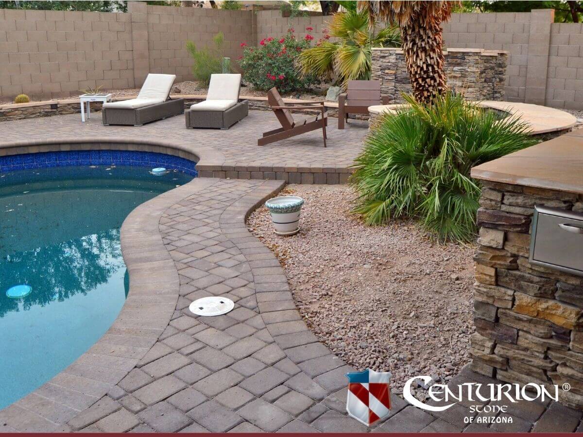 Paver patio with canyon ledge stone and flagstone detail in Gilbert, AZ