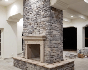 Center Fireplace In Home Decorated With Ledge Stone Veneers From Centurion Stone