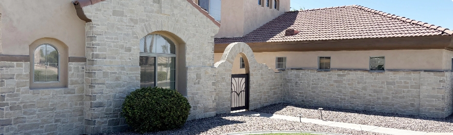 Custom light-toned limestone veneer facade